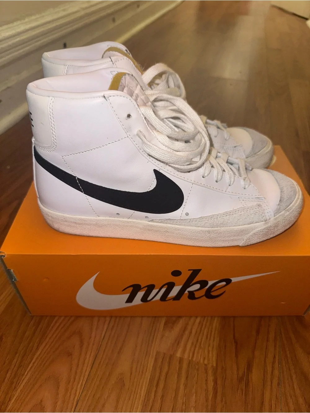 Nike Blazer Mid '77 white sneakers with black Nike swoosh
